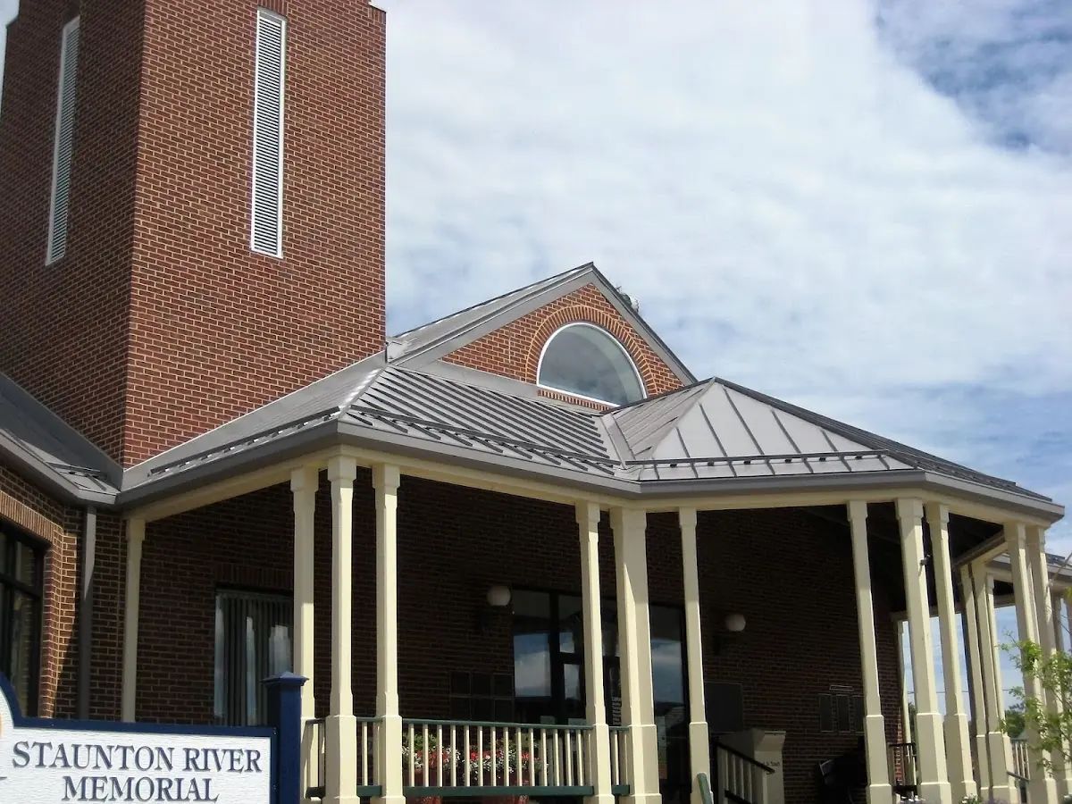 Skilled roofing craftsmen working on a residential roof in Hartsville